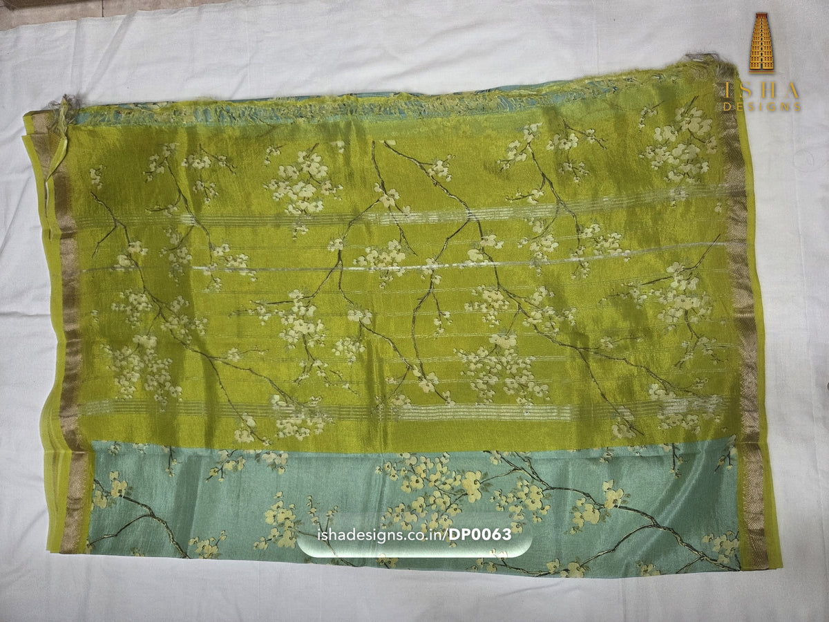 Woman wearing the Teal Cherry Blossom Olive Mangalagiri silk cotton saree with cream cherry blossom branches (3) (DP-0063)